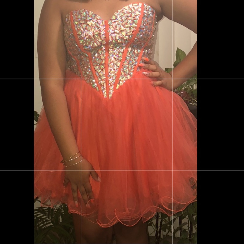 Orange fluffy homecoming/prom dress.